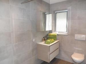 Kúpeľňa v ubytovaní Apartments Scheffau