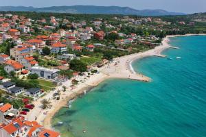 an aerial view of a beach with buildings and the ocean at Luxury Apartment RougeMarin in Pakoštane