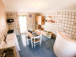 Kuchyň nebo kuchyňský kout v ubytování La Dimora al Mare + 133 fotografií