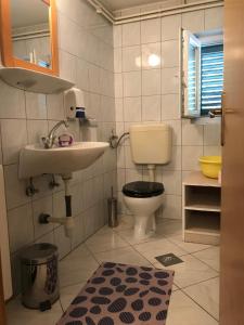 Ein Badezimmer in der Unterkunft Apartment house Berry