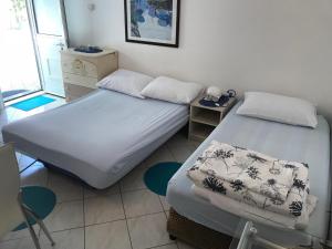 Ein Bett oder Betten in einem Zimmer der Unterkunft Apartment house Berry