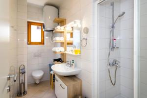 Ένα μπάνιο στο Apartman Ježevac +20 φωτογραφίες