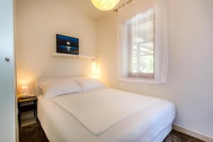 Ένα ή περισσότερα κρεβάτια σε δωμάτιο στο Apartman Ježevac