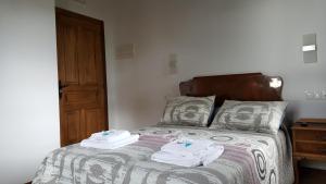 Postel nebo postele na pokoji v ubytování La Posada del Druida