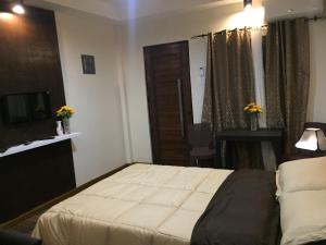 Postel nebo postele na pokoji v ubytování MIRASOL Residences