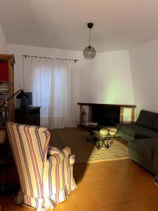 Posezení v ubytování CASA RURAL CORTIJO LAS HUERTAS
