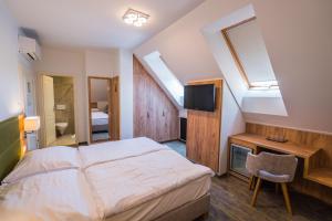 Postel nebo postele na pokoji v ubytování Hotel Diana