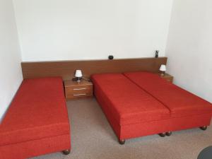 Postel nebo postele na pokoji v ubytování U Matěje