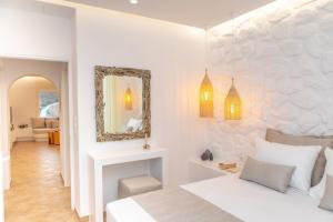 Tempat tidur dalam kamar di Naxian Pearl