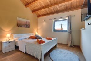 Postel nebo postele na pokoji v ubytování Haus Mila