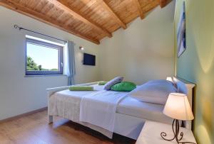 Postel nebo postele na pokoji v ubytování Haus Mila + 23 fotografií