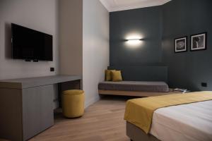 A bed or beds in a room at Domus Alberico