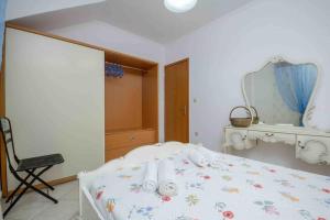 Posteľ alebo postele v izbe v ubytovaní Lovely Apartment for 6Ppl , 2 BDRM , in Naxos , private patio