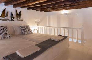 a bedroom with a large bed in a room at Apollonion house in Apollonia