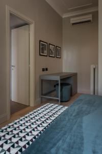 A bed or beds in a room at Domus Alberico