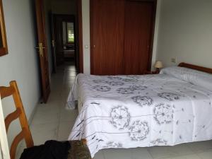 Postel nebo postele na pokoji v ubytování Apartamento fontiñas Sanxenxo montalvo