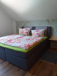 Ένα ή περισσότερα κρεβάτια σε δωμάτιο στο Ferienwohnung Csilla