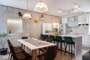 Kuchyňa alebo kuchynka v ubytovaní Casa Carminatti Apartments