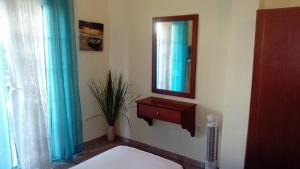 A bed or beds in a room at PLAZA Studios