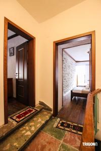 Rúm í herbergi á Trigona Guest House & Hostel