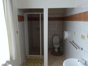 Koupelna v ubytování HOTEL STAŘÍČ