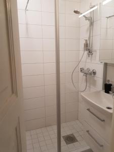Ванная комната в Kristian apartment City Center