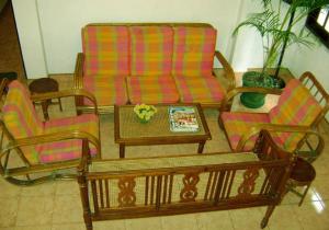 A seating area at Palm Garden Home Stay