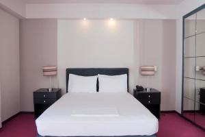 Postel nebo postele na pokoji v ubytování Hotel Victory