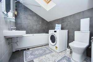 Ένα μπάνιο στο Luxury apartment in the heart