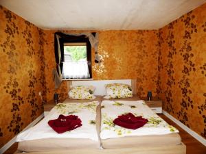 Ein Bett oder Betten in einem Zimmer der Unterkunft Relaxen am Eifelbach