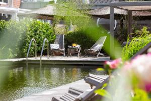 Zahrada ubytování Suiten-Hotel mare Langeoog + 80 fotografií