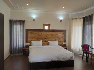 Postel nebo postele na pokoji v ubytování Shaolin Ladakh