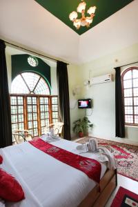 Letto o letti in una camera di LikeMyHome Homestay Mysore