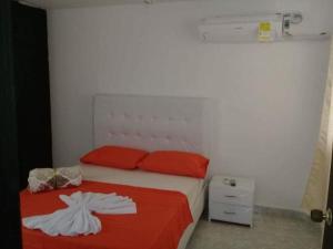 Tempat tidur dalam kamar di Casa Familiar Miguel Angel