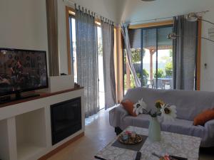 Et tv og/eller underholdning på Albufeira Oura Beach V4 Villa Marisa with private Pool