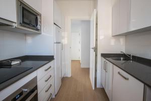 Kuchyňa alebo kuchynka v ubytovaní Ibericabeds Granada