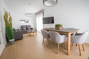 Televízia a/alebo spoločenská miestnosť v ubytovaní Ibericabeds Granada