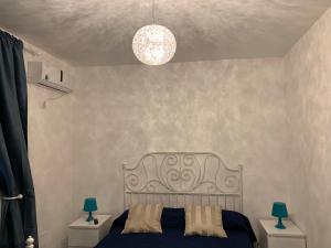 Кровать или кровати в номере Residence Serrone