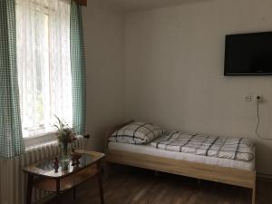 Postel nebo postele na pokoji v ubytování Chaloupka