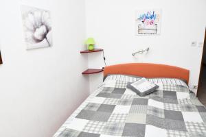 Postel nebo postele na pokoji v ubytování Apartments Josip