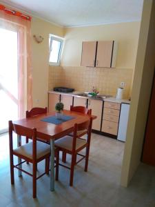 Kuchyň nebo kuchyňský kout v ubytování Apartments M&Z