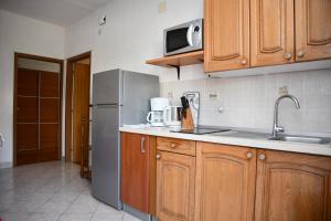 Kuchyň nebo kuchyňský kout v ubytování Apartments Josip