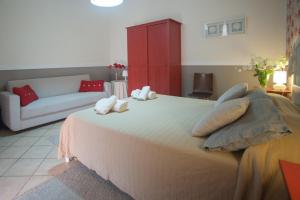 A bed or beds in a room at A Corte