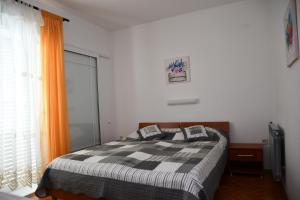 Postel nebo postele na pokoji v ubytování Apartments Josip