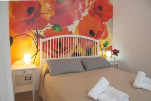A bed or beds in a room at A Corte