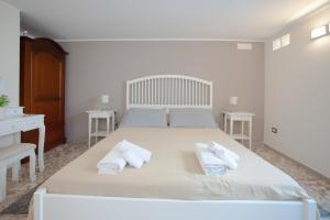 A bed or beds in a room at A Corte