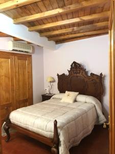 En eller flere senge i et værelse på Casa Barrero