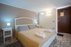 A bed or beds in a room at A Corte