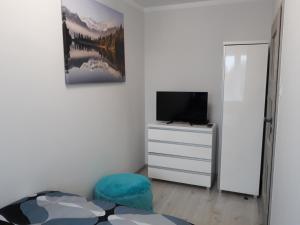 Telewizja i/lub zestaw kina domowego w obiekcie Katrin House