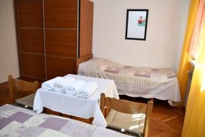 Postel nebo postele na pokoji v ubytování Apartments Josip
